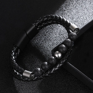 Mens woven leather bracelet with black lava stone beads and silver metal accent