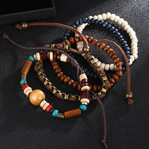 Bohemian multilayer beaded wood bracelet set with leather cords and ethnic style charms