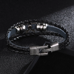 Retro multi-layer black braided leather bracelet for men featuring a silver star charm