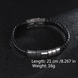 Detail showing 21cm black braided leather bracelet with seven stainless steel beads