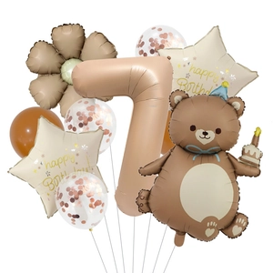Detail view of earth-tone balloon set featuring bear, number 7, and daisy shapes