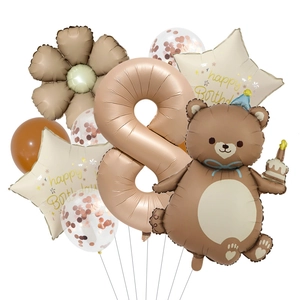 Detail of 8th birthday set with brown bear balloon, number 8 foil and star accents