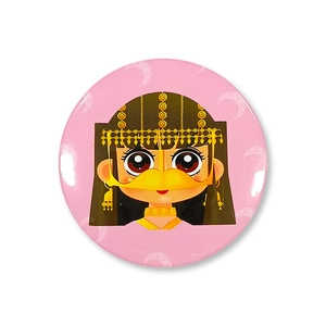 Detail of round Middle East festive tinplate badge with cartoon moon and girl illustration