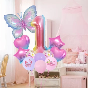 Close-up of pink gradient butterfly balloons and birthday party decor set for girls