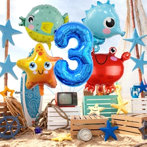 Kit ballons 3ème anniversaire thème océan avec hippocampe et crabe sur fond de plage
