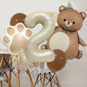 Detail view of number 2 balloon with brown bear and cream latex balloons for 2nd birthday