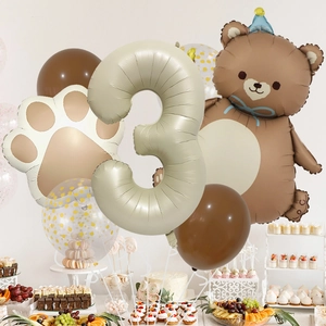 Balloon set detail with cream number 3, brown bear, and polka dot balloons for party