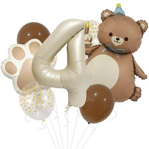 Detail of caramel bear and cream number 4 balloons with gold polka dots for birthday party
