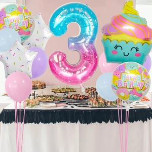 Close-up of ice cream theme 3rd birthday balloon set with cupcake and gradient number