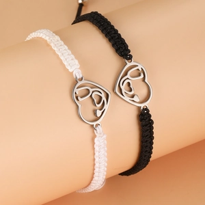 Handmade woven couple bracelets with stainless steel heart stethoscope charms in black and white