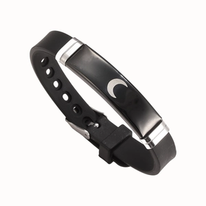 Adjustable black silicone bracelet featuring a polished metal plate with silver crescent moon