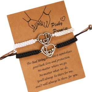 Pinky Promise heart stethoscope charms on black and white handmade woven couple bracelets