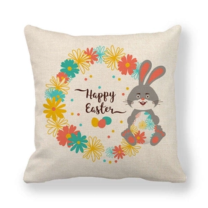 Close-up of linen Easter pillowcase texture with bunny, daisies and Happy Easter print