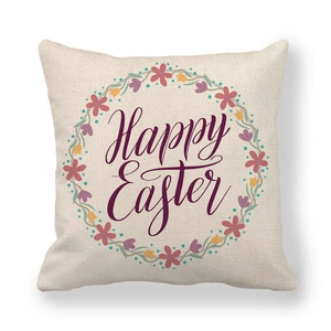 Close-up of Easter linen pillowcase with floral wreath and Happy Easter lettering