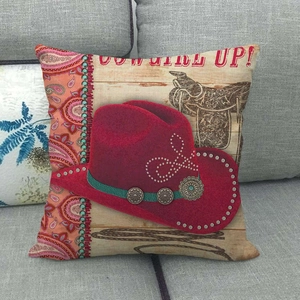 Linen throw pillow cover with red cowboy hat, wood texture, and COW GIRL UP text