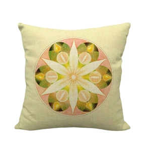 Linen square throw pillow cover featuring geometric mandala print with green and orange accents