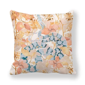 Detail view of peach skin fabric cushion cover with snake and floral marble patterns