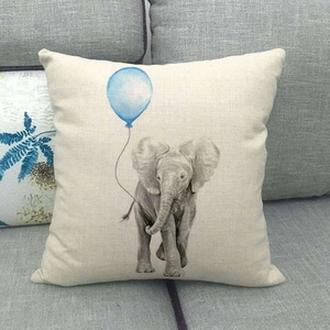 Linen cushion cover with hand-painted elephant and blue balloon on beige textured fabric
