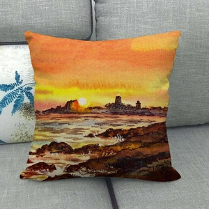 Detail of artistic sunset scenery linen cushion cover showing fabric texture on sofa
