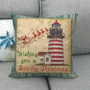 Close-up of nautical lighthouse and seahorse sleigh print on textured linen pillow cover