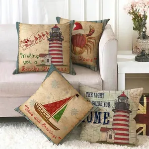 Set of four nautical Christmas linen pillow covers featuring lighthouse and crab patterns