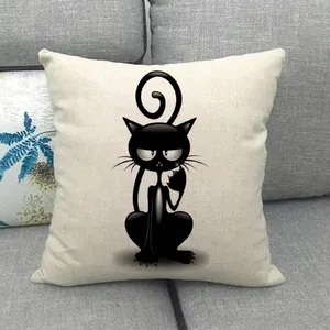 Detail of minimalist cat illustration on beige linen pillowcase on a grey sofa
