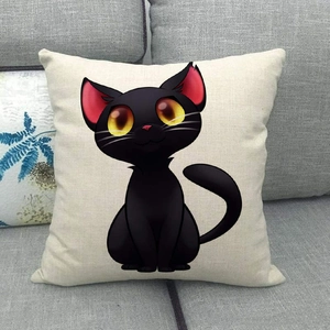 Minimalist linen pillowcase featuring a cute black cat pattern on a grey sofa