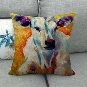 Detail of colorful oil painting cow print on textured linen decorative cushion cover