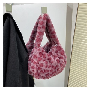Detail of pink leopard print faux fur tote bag showing soft plush texture and pattern