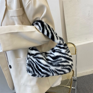 Fashionable zebra print plush shoulder bag with black and white animal patterns for autumn