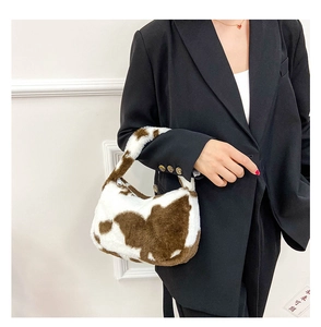 Mini sac à main en peluche avec motif vache marron et fermeture éclair en métal