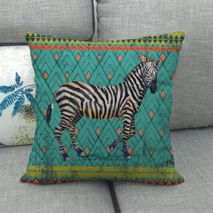 Linen decorative throw pillow cover with zebra illustration on a grey sofa