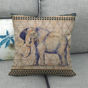 Detailed texture of linen cushion cover featuring realistic elephant and geometric patterns