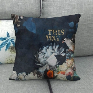 Linen-style oil painting floral bird cushion cover with 'THIS WAY' text on gray sofa