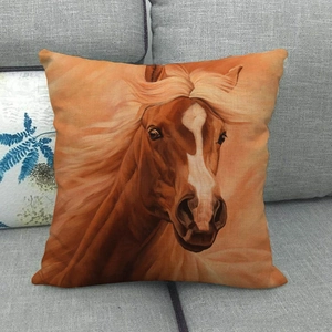 Linen pillow cover featuring a realistic brown horse portrait on a gray sofa