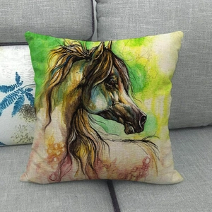 Macro shot of linen textured pillow cover with watercolor horse head artwork on sofa