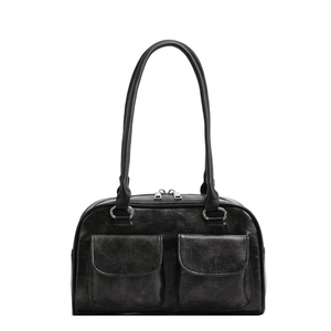 Vintage black leather shoulder bag with two front pockets and long double handles