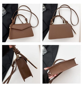 Detail shots of deep brown litchi pattern trapezoid bag with knotted handle and gold hardware