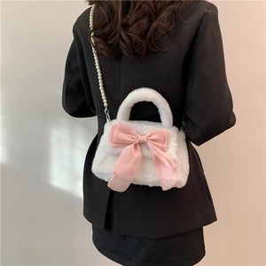 White faux fur handbag with pink silk bow and pearl chain, trendy crossbody for women