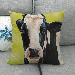 Detailed texture of linen throw pillow cover featuring a realistic cow face print