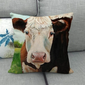 Detailed texture of linen throw pillow case featuring realistic cow oil painting design
