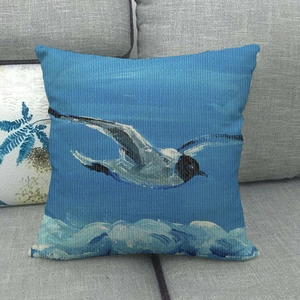 Linen decorative pillowcase featuring hand-drawn flying seagulls and ocean wave patterns