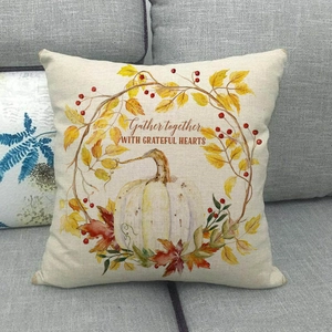 Detail of linen pillowcase with white pumpkin autumn wreath and Grateful Hearts text