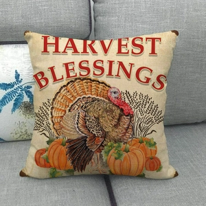 Macro detail of linen pillow cover with turkey, pumpkin, and Harvest Blessings text