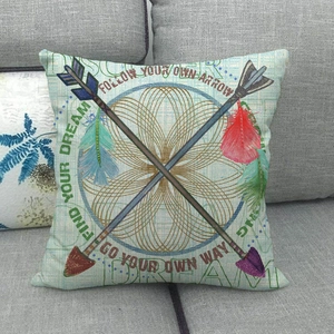 Bohemian bird arrow print linen throw pillow case on a grey sofa for home decor