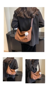 Three-way view of caramel brown crescent hobo bag with white fuzzy charm decoration