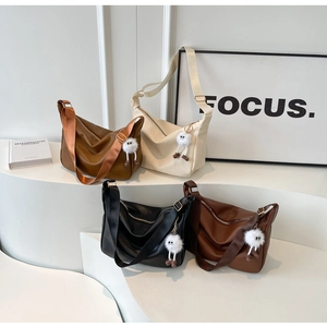 Minimalist soft PU leather tote bags with wide shoulder straps in four colors and plush charms