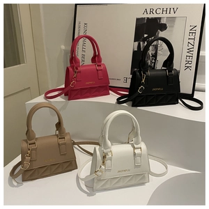 Quilted mini handbags in rose, black, khaki and white with adjustable shoulder straps