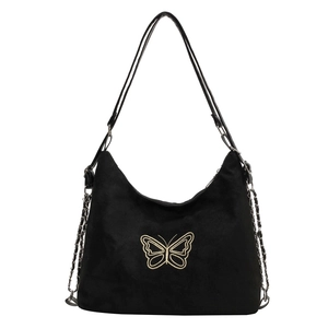 Black velvet tote bag with gold butterfly embroidery and metal chain strap details