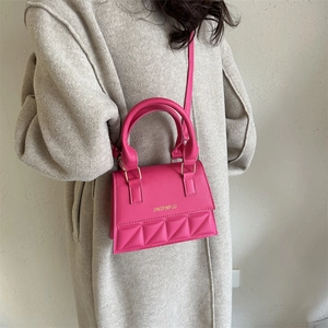 Retro fuchsia quilted crossbody mini square bag with gold lettering and top handle